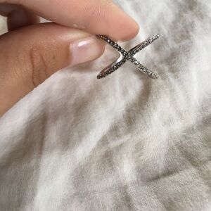 Claire’s Silver ring rhinestone accents x shaped